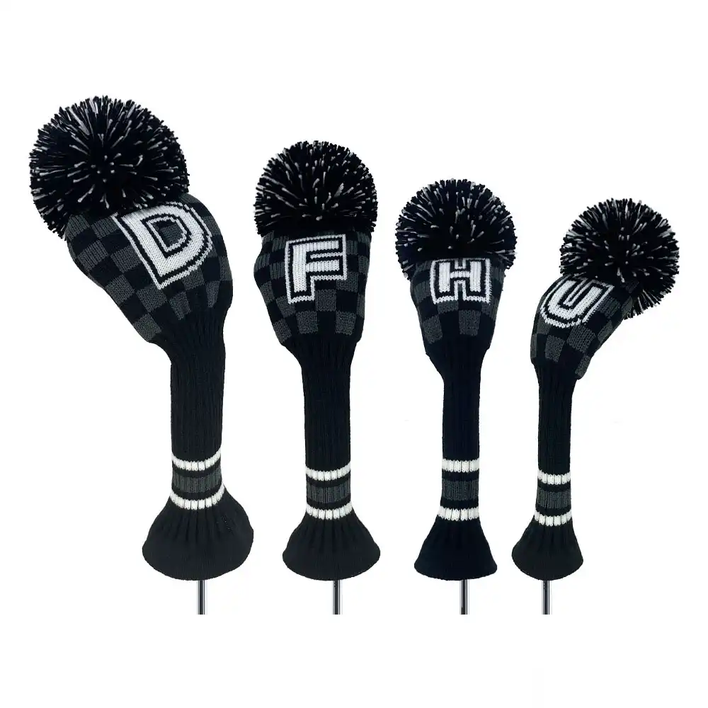 CheckMate Collection DFHU four-piece golf headcover set — black and white — lifestyle view on golf course